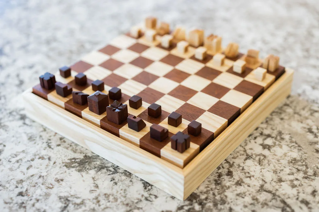 Custom unique chess board in ash and sapele with minimalist geometric pieces set up for play — beth & co. woodworks, Sierra Vista, AZ