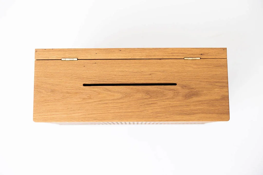 Top view of the offering slot on a custom lockable donation box in solid white oak with hard wax oil finish — beth & co. woodworks, Sierra Vista, AZ