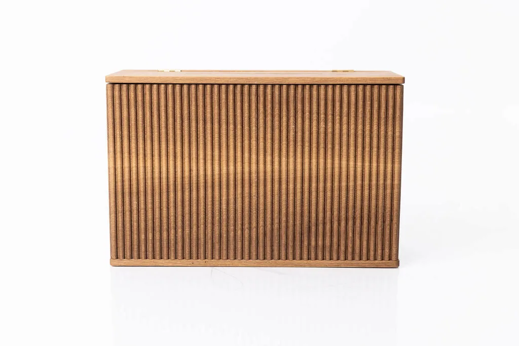 Close-up of fluted panel detailing and natural grain on a custom wooden donation box in solid white oak — beth & co. woodworks, Sierra Vista, AZ